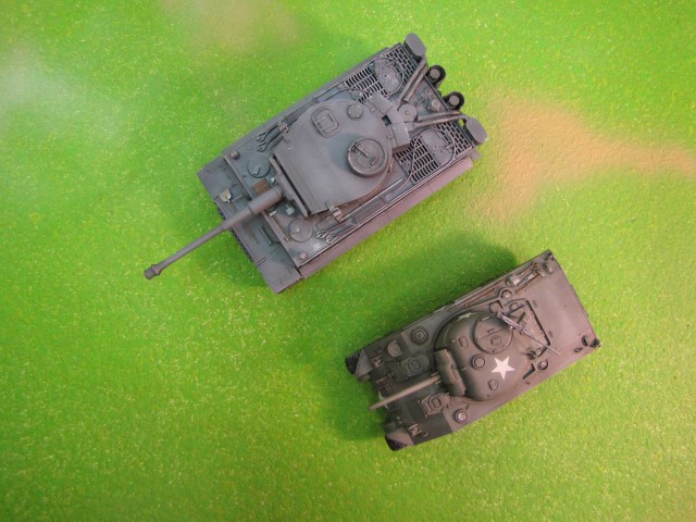 Tiger and Sherman.  Two tanks built for very different reasons.