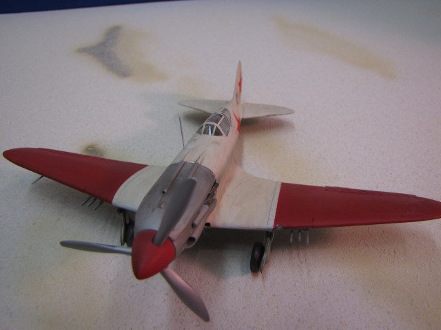 The MiG-3 was armed with a single 12.7 mm machine gun and two 7.62 mm machine guns; all in the cowling. That's one heavy, and two light MGs, all with disruptor gear to fire through the propeller. VERY light firepower for 1941.