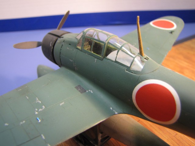 All Rufes were delivered in the early war all grey color.  But in early 1943 this aircraft received a coat of Navy Green camouflage all over, except under the canopy!