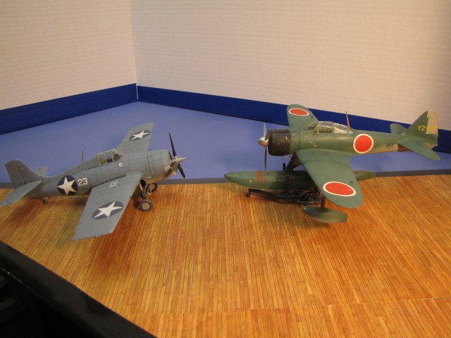 Deadly rivals in the Solomon Islands, 1943.  The Wildcat would clearly be faster than this version of the Zero.  But still less maneuverable.