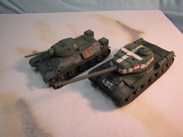 Late war partners; an IS-2 and T-34. As a "breakthrough" tank the IS-2 was expected engage in heavy combat at the front to force a breach.  This would allow the much faster T-34 to penetrate into an enemy's rear areas.
